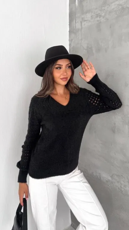 Black sweater with openwork sleeves and shawl collar